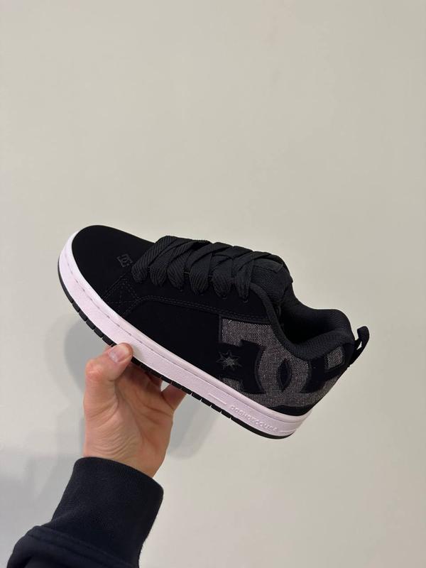 Dc black sneakers sales