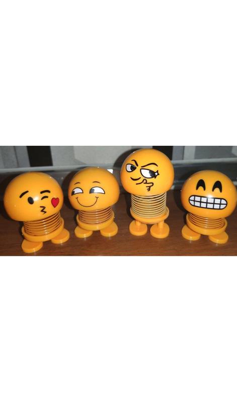 Smiling face spring doll deals