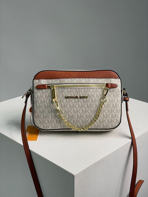 shoe care kors jet set large logo crossbody bag ivory 2700 175793322 House of Holland cross body