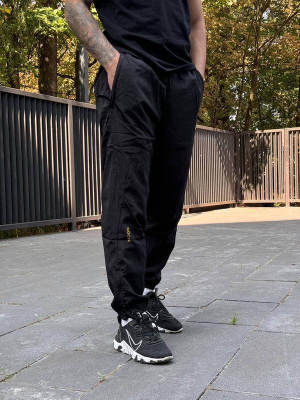Штаны nike x drake nocta nrg woven track pants black yellow штани