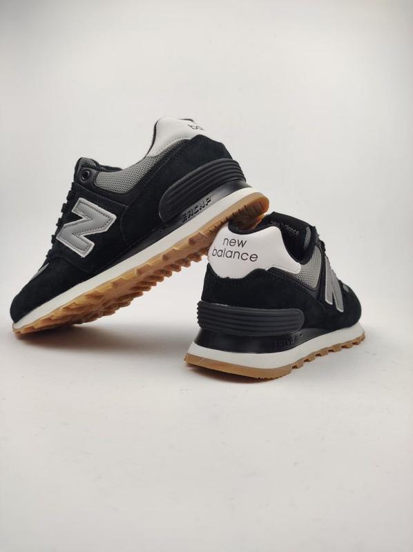 New balance 574 sport negras sale