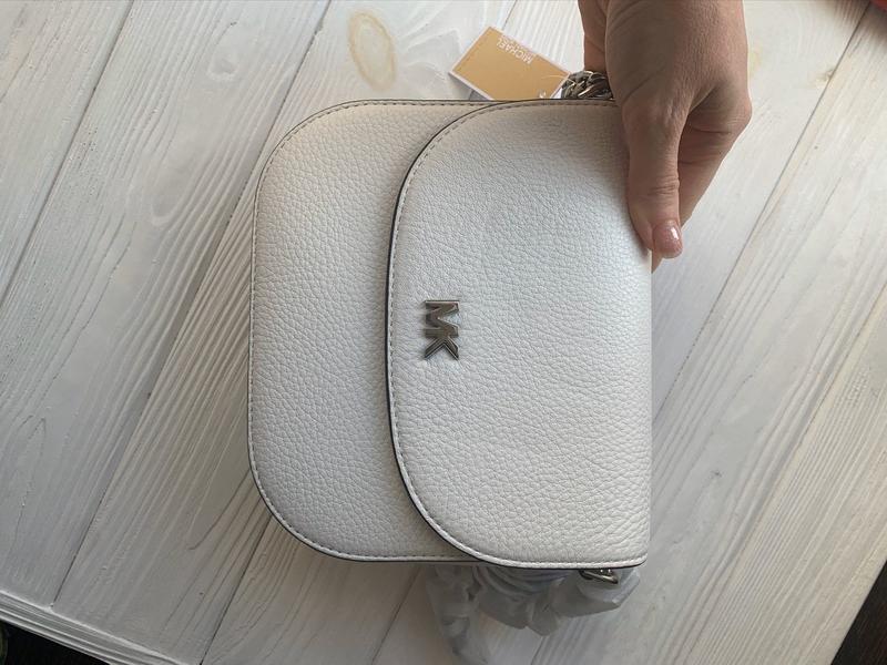 mott pebbled leather dome crossbody bag