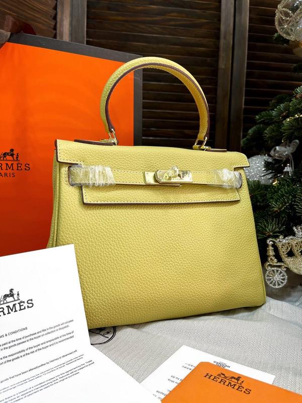 141991719 hermes cuir kelly 7650 Sac cabas hermes cuir Toto Bag en toile vert kaki et noire