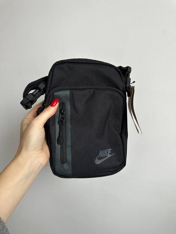 Nike store tech sling