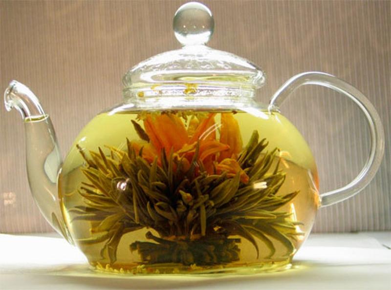 Зеленый чай цветок распускается. Чай раскрывается цветком как называется. Чай раскрывается цветком как называется. Юй лун тао персик дракона чай. Юй лун тао чай.