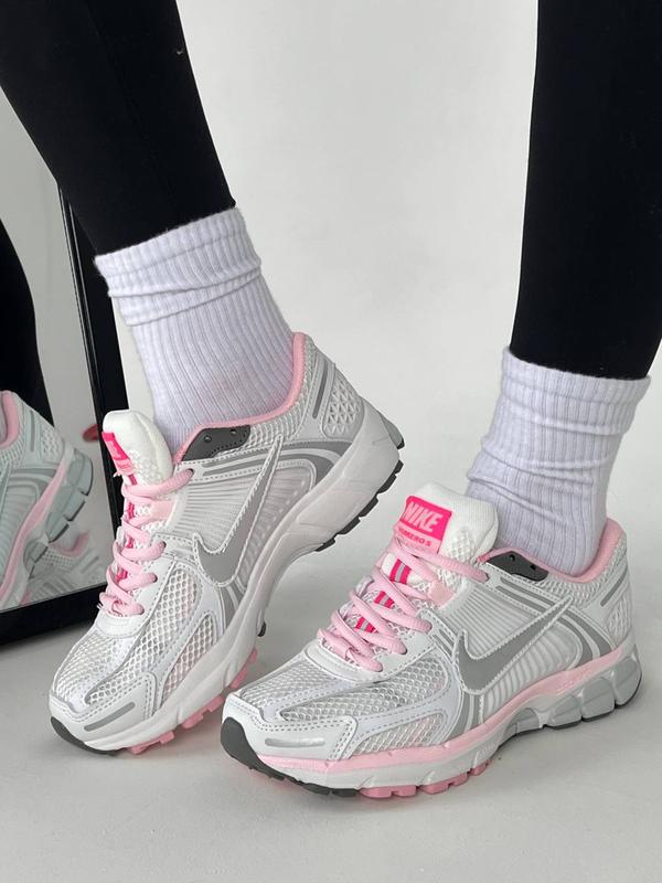 Kids pink nike sale