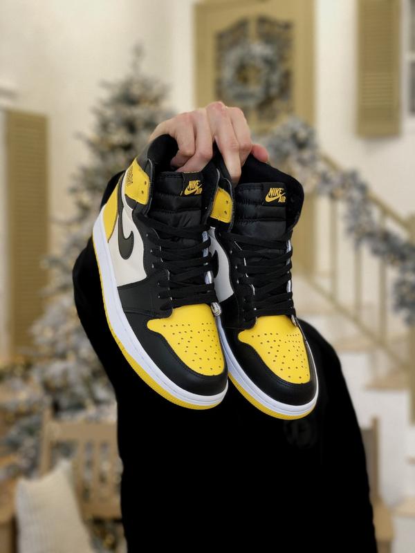 Jordan black and yellow sales 1