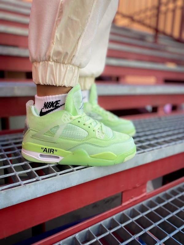 Lime green best sale jordan 4