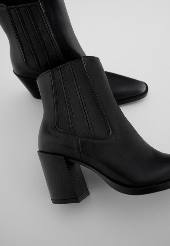 На підборах