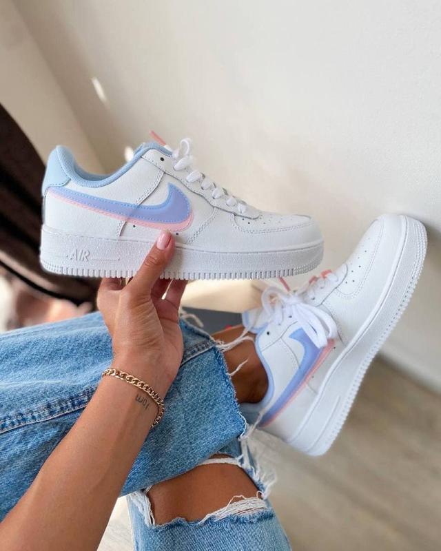 Air force ones store with blue swoosh