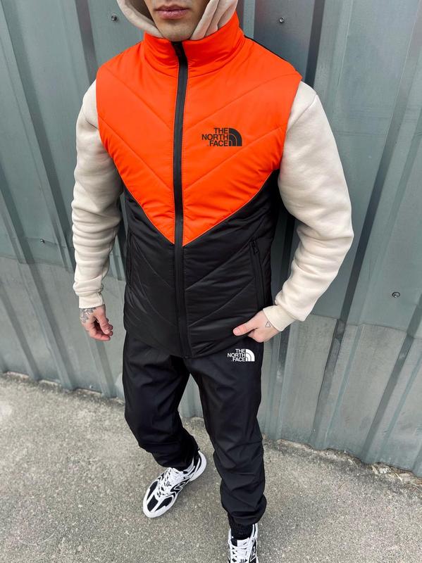 Мужская жилетка the north face черная с оранжевым без капюшона ...