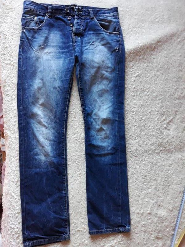 Синие джинсы с потертостями — цена 1623 грн в каталоге Джинсы Купить ...